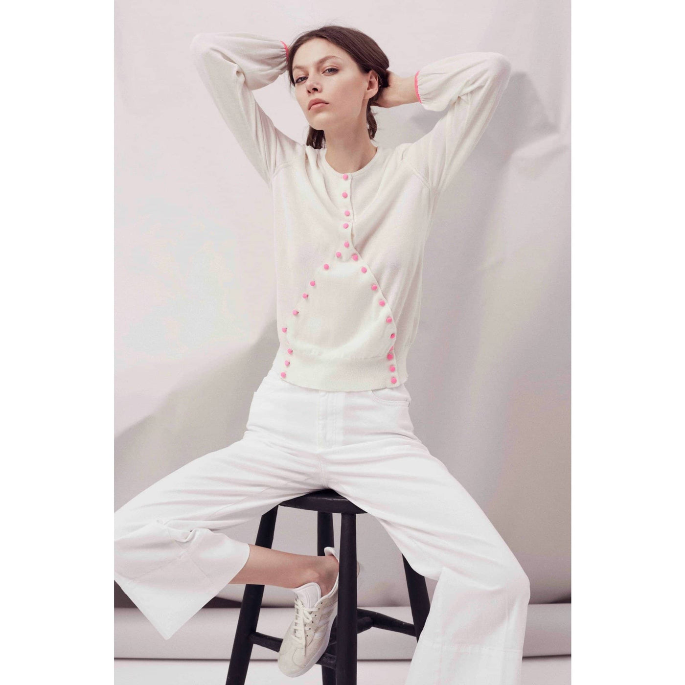 Model wearing Wisp Fluro Criss Cross Sweater