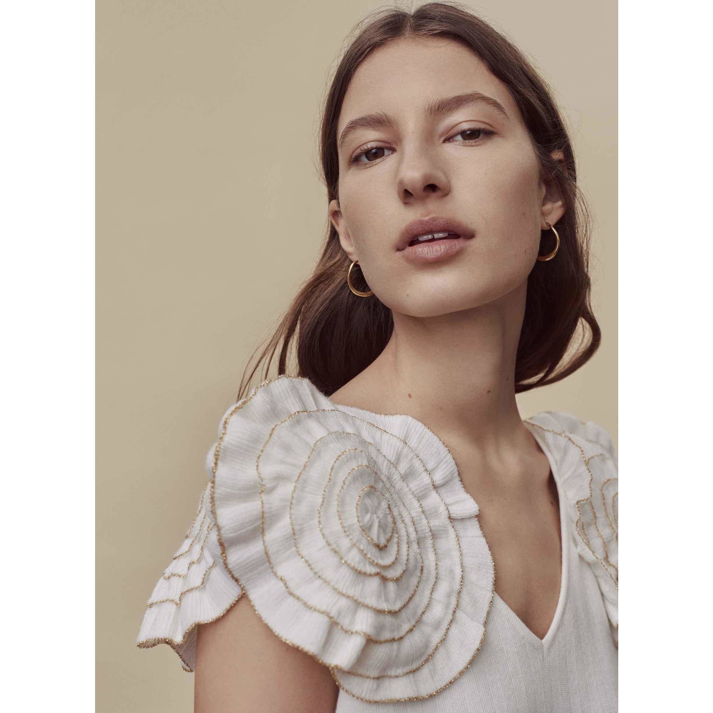 Model wearing Wisp Rosetta Sweater